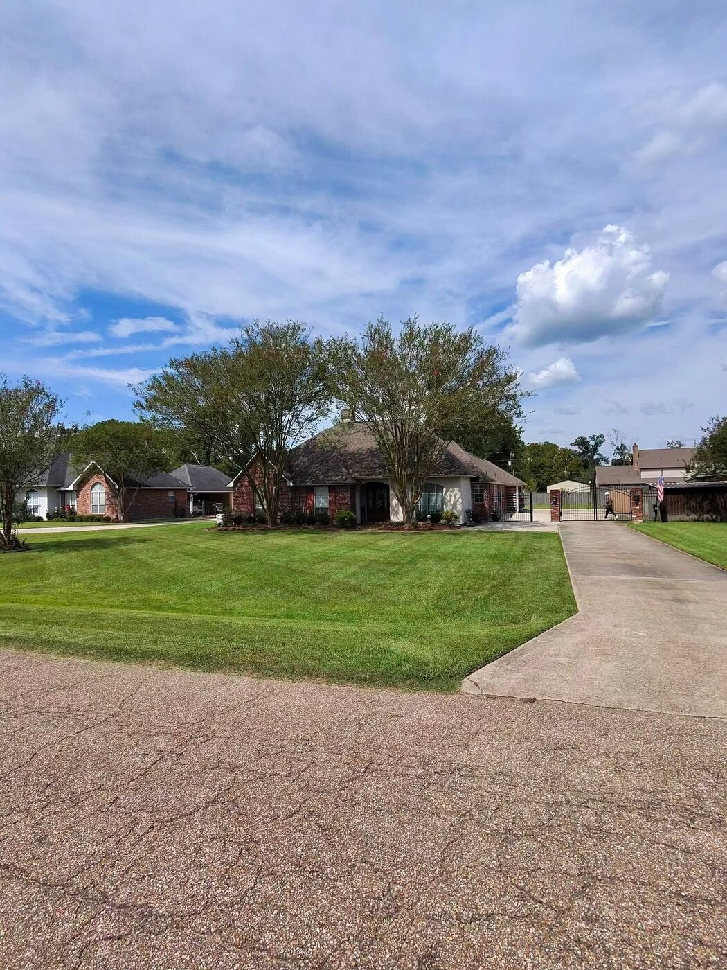 Manicured lawn along driveway