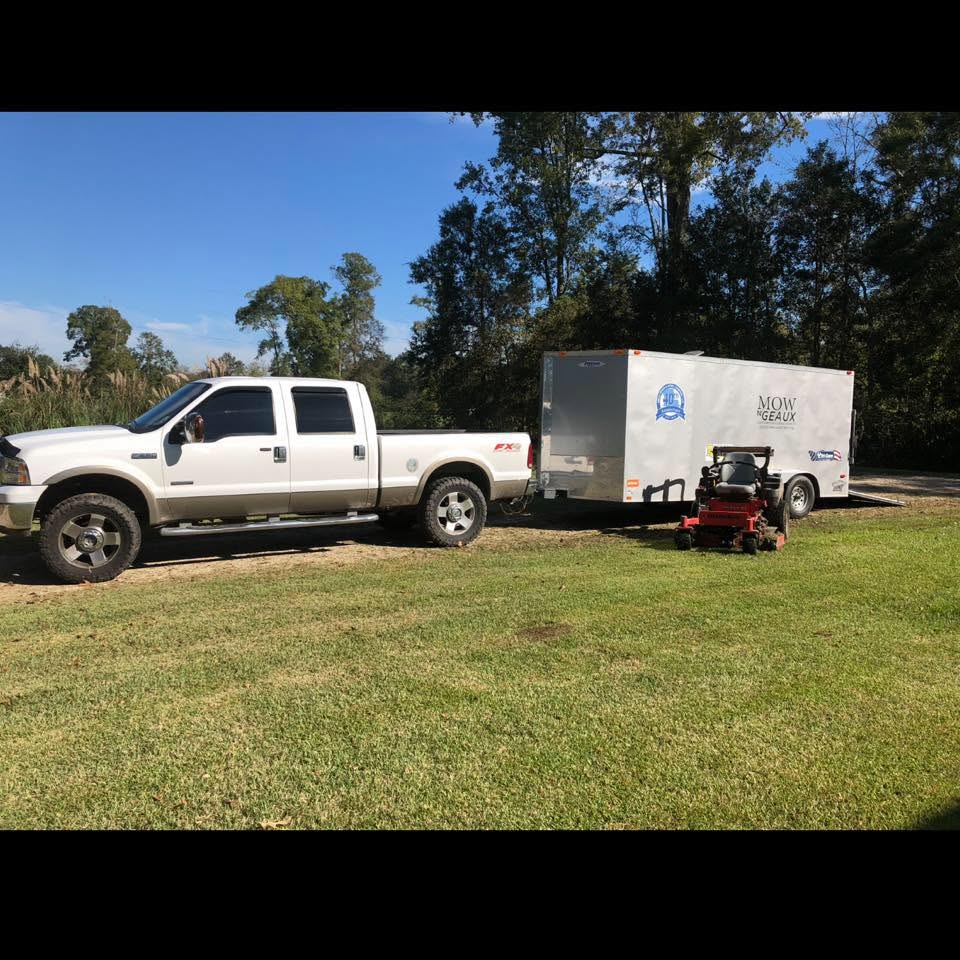 Ascension Mow N' Geaux truck, trailer and equipment ready for a local property project
