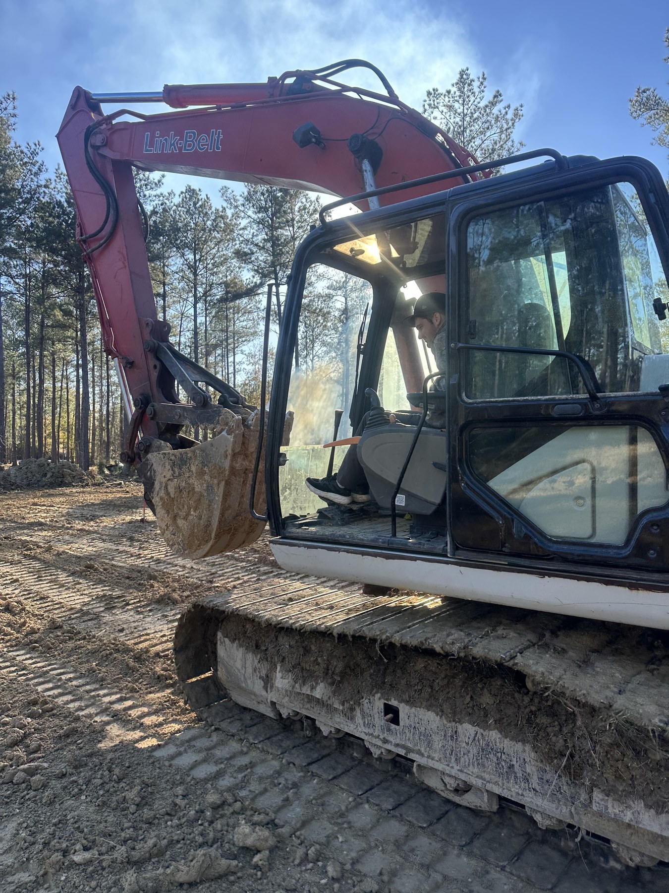 Excavator working on a freshly cleared property