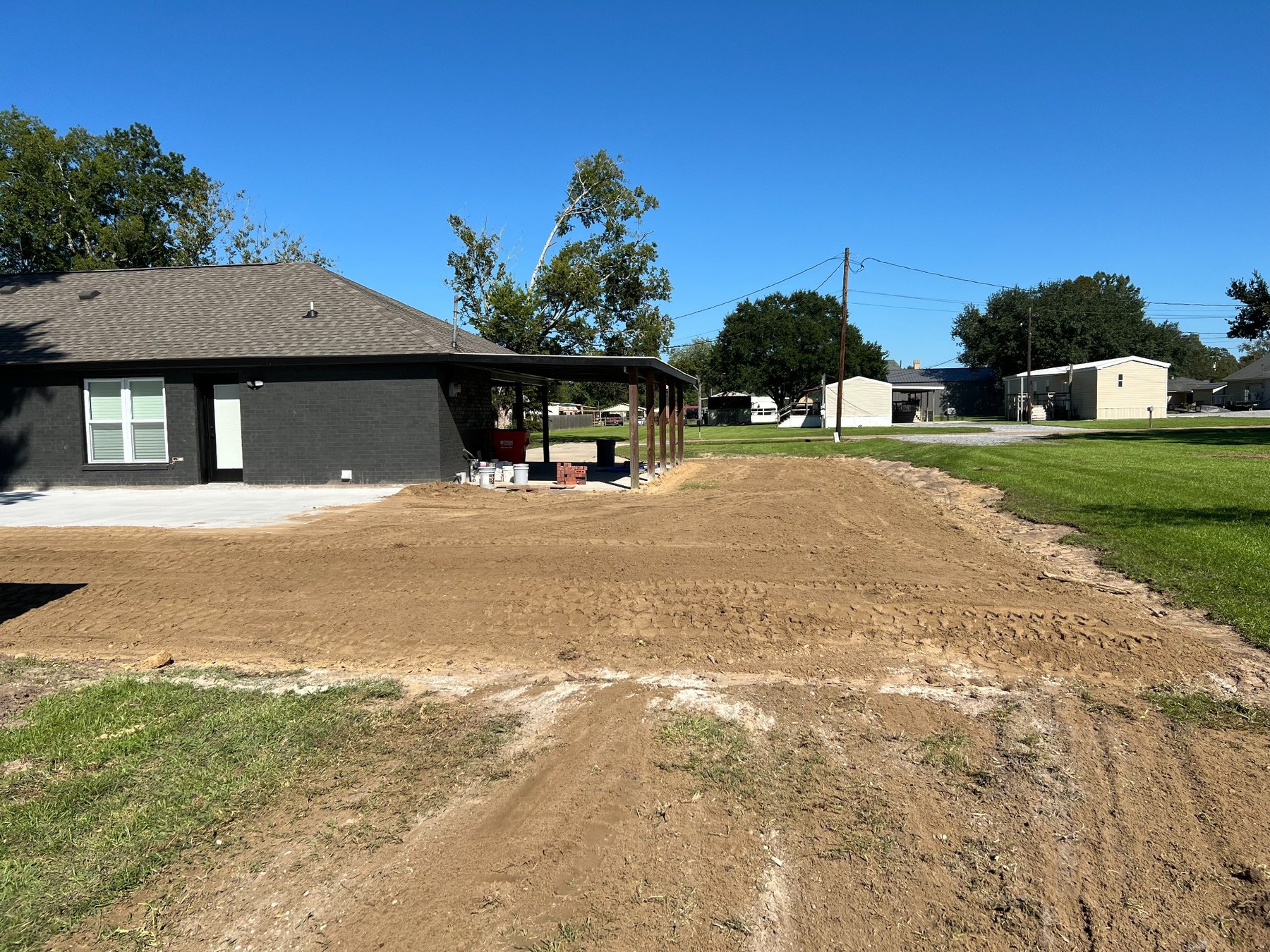 Residential lot brought to a smooth working grade