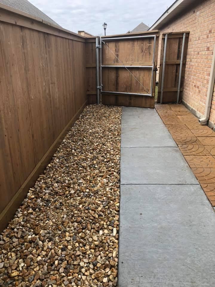 Fresh rock bed installed beside a home